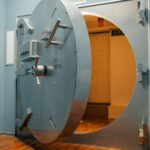 Bank security system, opened vault door Bank security system, opened vault door, safety and reliable protection, nobody. Depository entrance, secure and complex lock